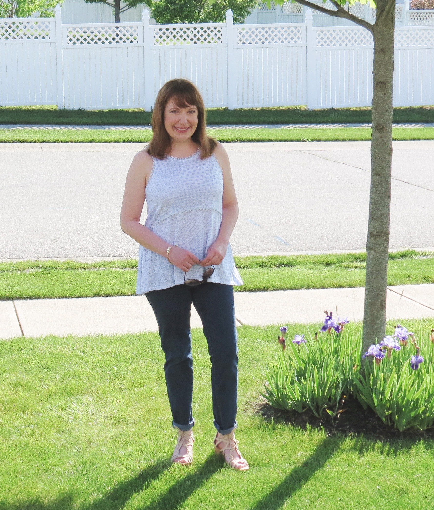 Light Blue And White Sleeveless Top With Jeans