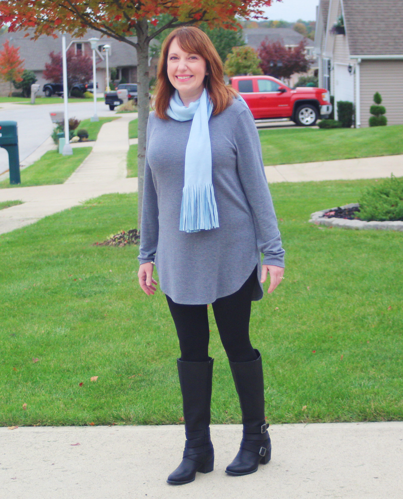 Gray Tunic And Tall Black Boots