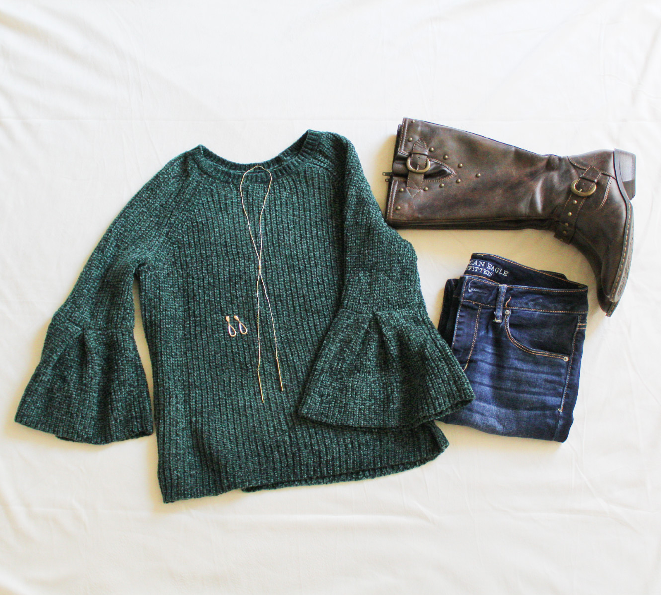 Green Sweater, Jeans, Boots, Earrings, And Necklace