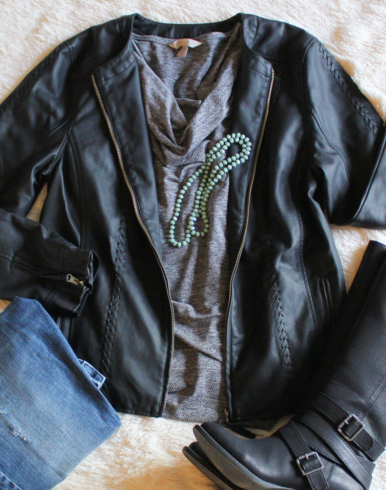 A Winter outfit featruing a faux leather jacket and green beaded necklace. Fashion/Jewelry/Winter Outfit