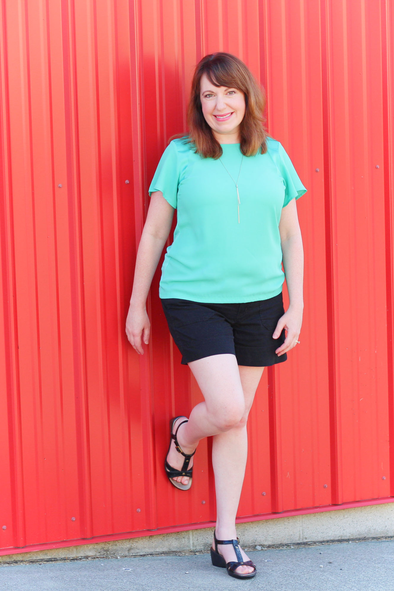 Green Top And Black Shorts #summeroutfit #fashionover40