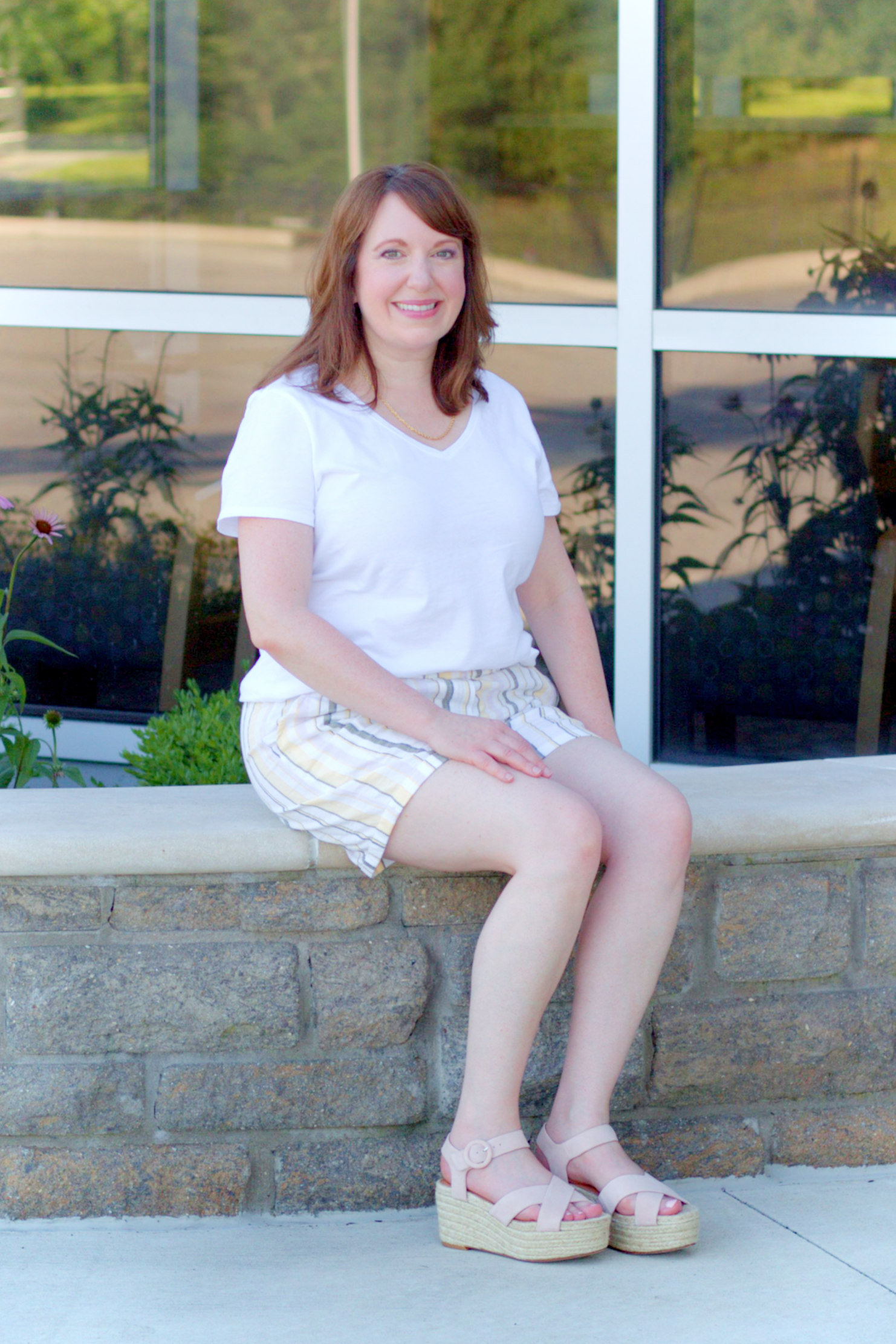 Dianna Sitting On Stone Wall In Summer Outfit