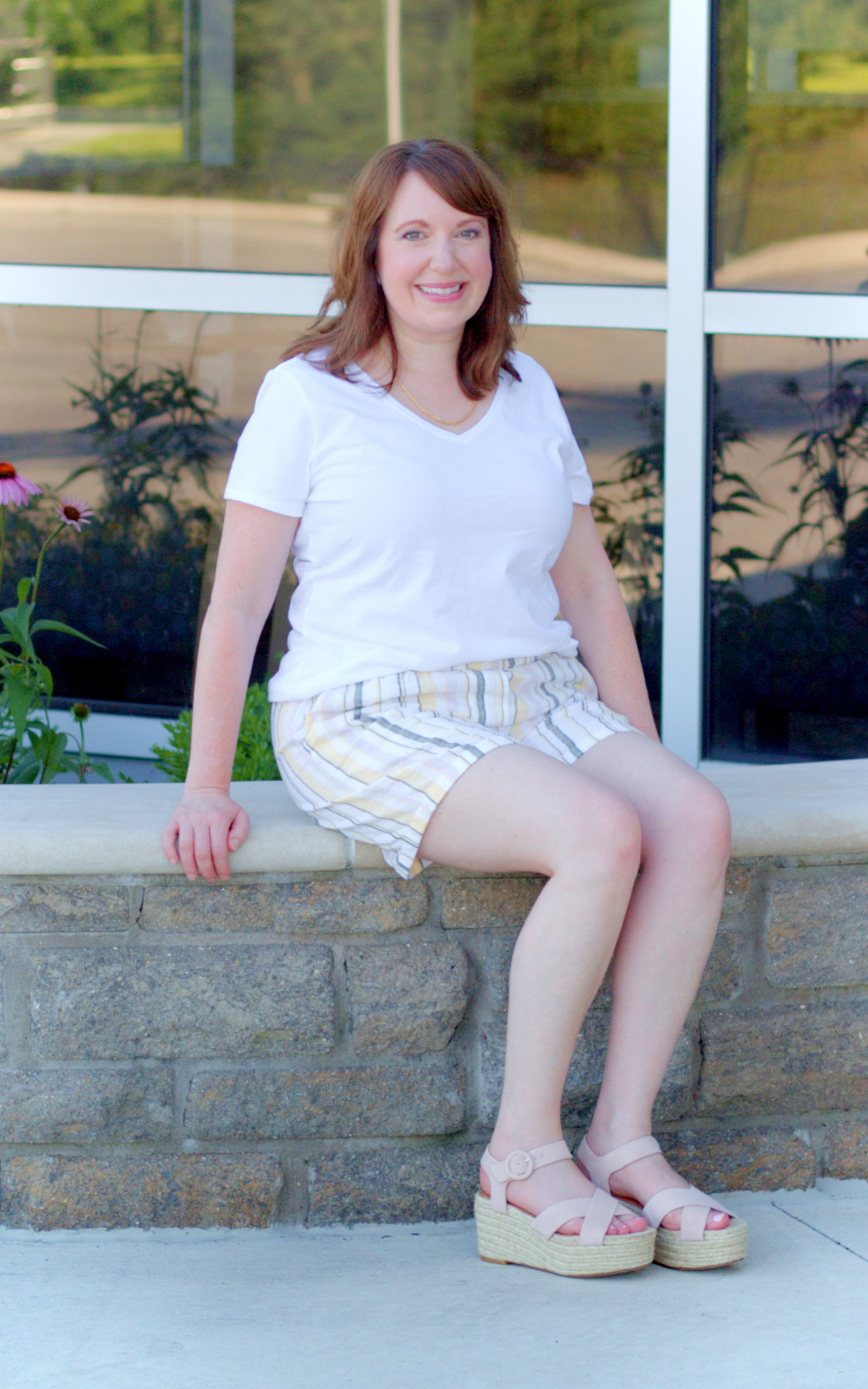 Dianna Sitting On Stone Wall