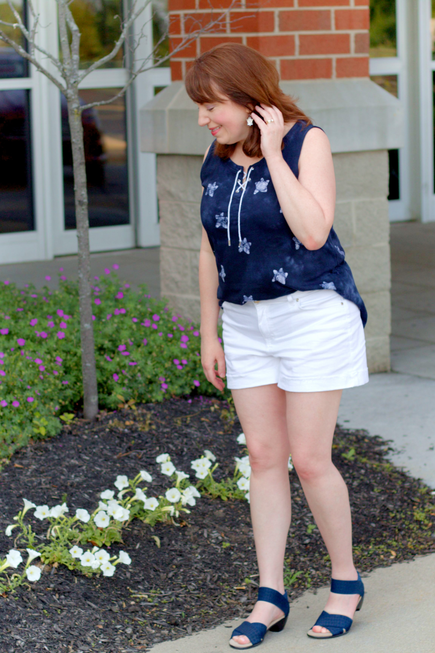 Dianna Looking At Flowers