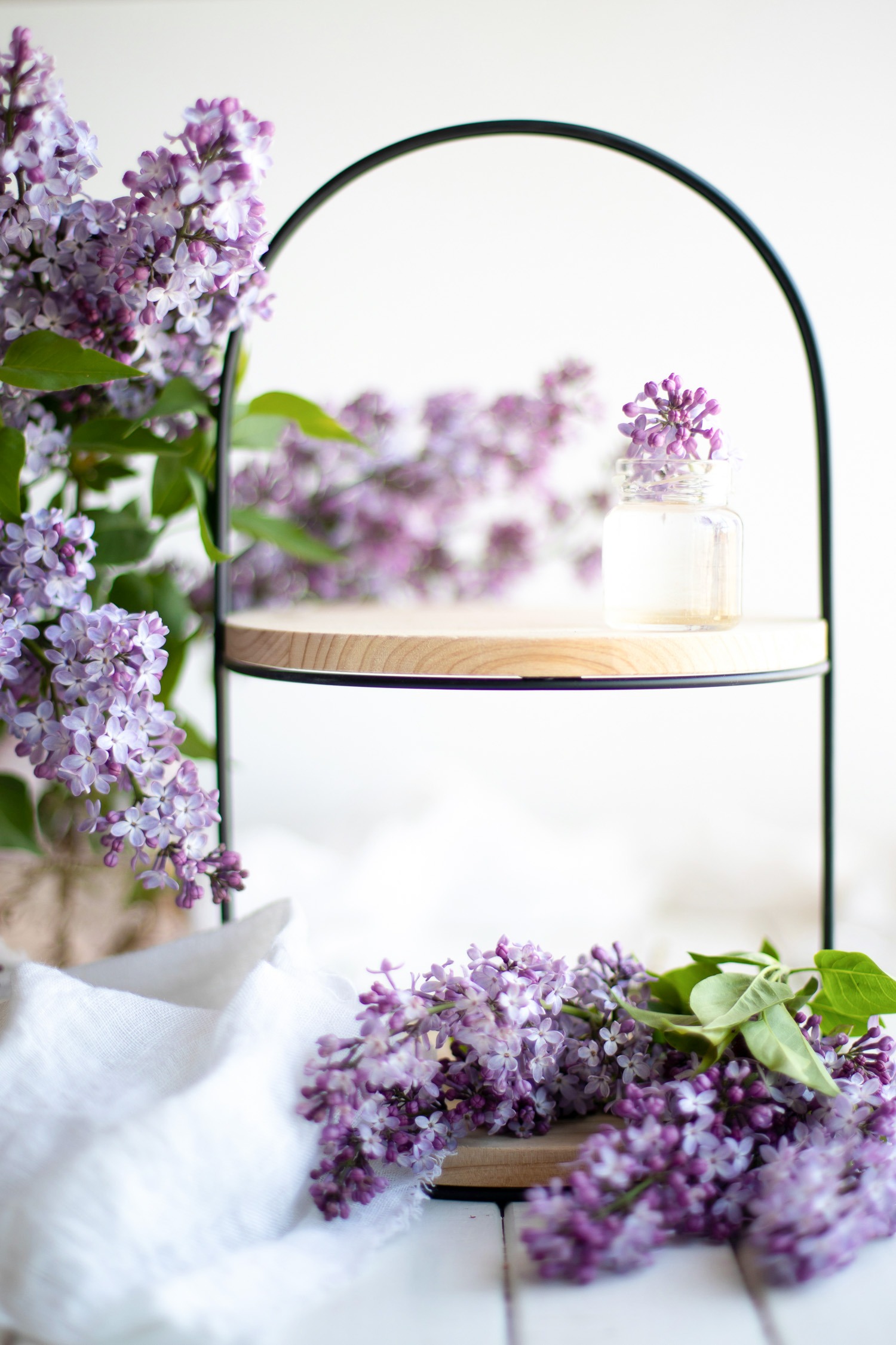 Purple Lilacs Around a Shelf